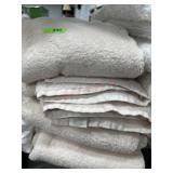 4 Tan bath towels