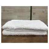 2- 24x60 white bath mats