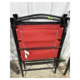 Black and red folding lawn chairs