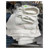 Stack of white bath and hand towels