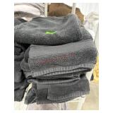 Stack of black bath towels