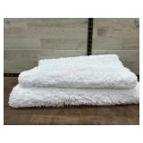 2- 20x36 white bath mats