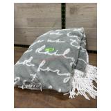Grey and white throw blanket