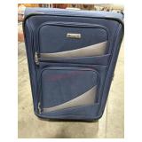 Blue rolling suitcase