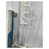 Security pole and curve grab bar