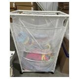Mesh bin with life jacket and pool items