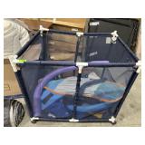 Mesh bin with pool floats and misc.
