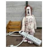 Flat with rag doll and wood letter rack, multi