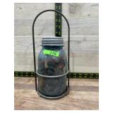Metal jar holder with old blue can jar
