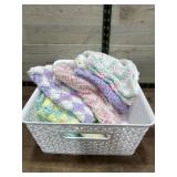 Tote of hand made baby coverlets