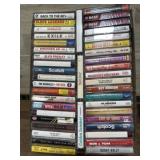 Flat of mixed genres music cassettes