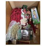 Box of  Christmas beaded garland and decorations