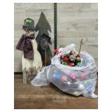 Wooden snowman figure and bag of Holiday