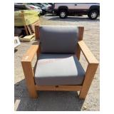Teak wood outdoor chair small scuffs to the wood