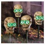 4 Skull Stake Lights with Green Eyes