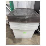 Stack of Four Plastic Storage Bins