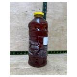 Pine-Scented Cleaning Solution in Plastic Bottle