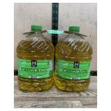 Two Plastic Bottles of Canola Oil