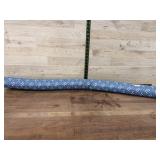 Roll of Blue Patterned Fabric Textile