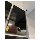 WALL MOUNTED LG TELEVISION - APPROXIMATELY 52
