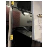 WALL MOUNTED LG TELEVISION - APPROXIMATELY 52