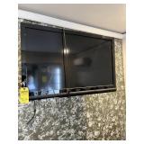 VIZIO TELEVISION (MOUNTED)