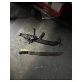 MACHETE WITH DECORATED LEATHER SHEATH
