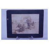 11 antique photos, one framed