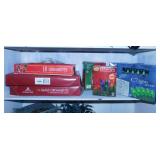 Christmas tree ornaments & lights in boxes