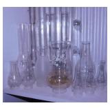 12 glass lamp chimneys, tallest is 14"