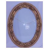 Ornate antique oval frame w/ convex glass,