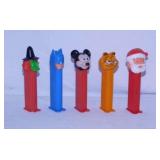 11 PEZ candy dispensers: Batman - Garfield -
