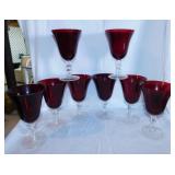 8 ruby red glass water goblets w/ clear stems,