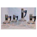 4 Mid Century glass / metal / bakelite carafes w/