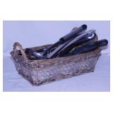 Basket full of kitchen utensils: Knives - Ladles -