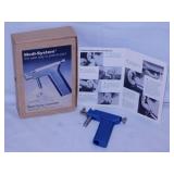 Medi-System ear piercer gun w/ manual in box -