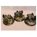 3 Thomas Kinkade lighted cottage figurines