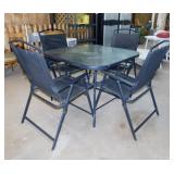 Square glass top patio table and 4 metal framed