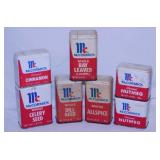 7 vintage McCormick spice tins - Cast iron napkin