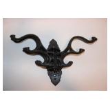 Antique wall mounted cast iron swivel coat hanger