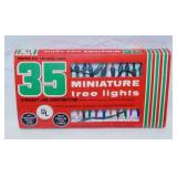 Strands of Christmas lights, one new in box - New