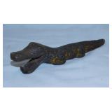 Antique cast iron alligator crocodile bottle