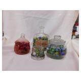 4 containers of marbles