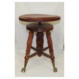 Antique organ stool w/ glass ball & claw feet,
