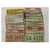 12 sets of embossed metal Illinois license plates