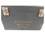 Danville Beauty School case full of hair rollers,