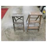 Two wooden 2-step folding ladders