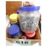 8 plastic jars full of misc. hardware