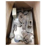 Box of old metal items: Sad iron - Shoe last -