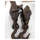 2 antique pulleys w/ hooks